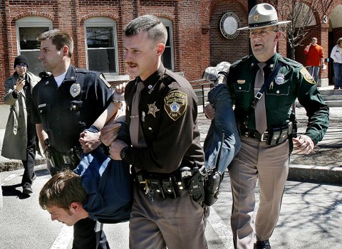 Patrick Shields being hauled from Keene district court